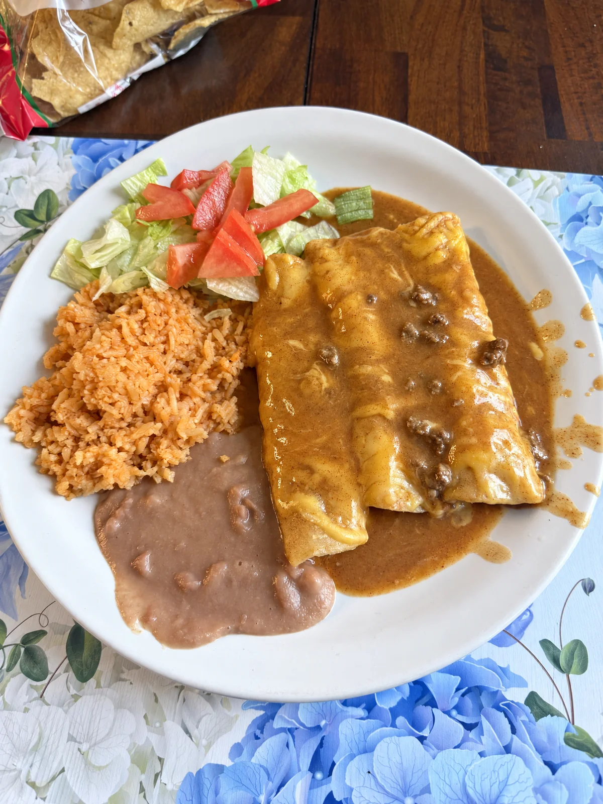 Lino Cantú’s enchiladas with rice, beans and a side salad